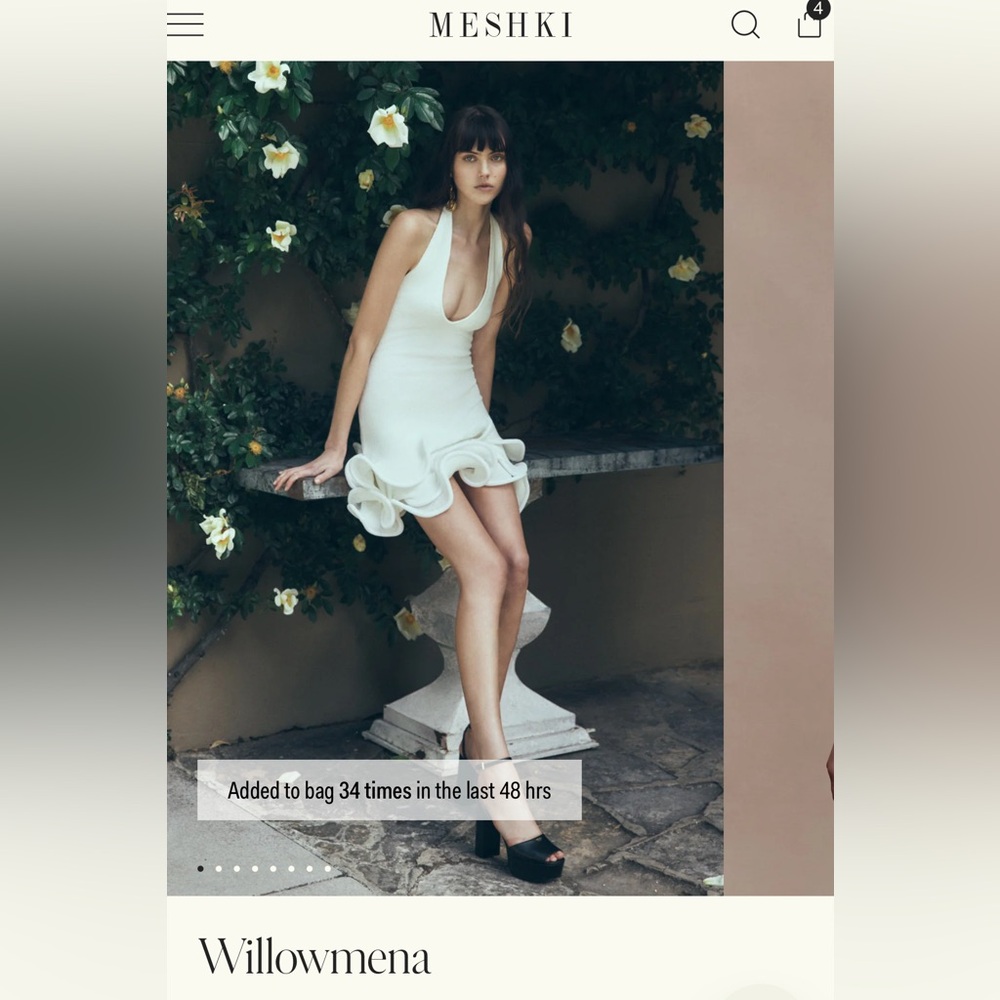 Meshki Sleeveless White Ruffle-Hem Willowmena Mini Dress